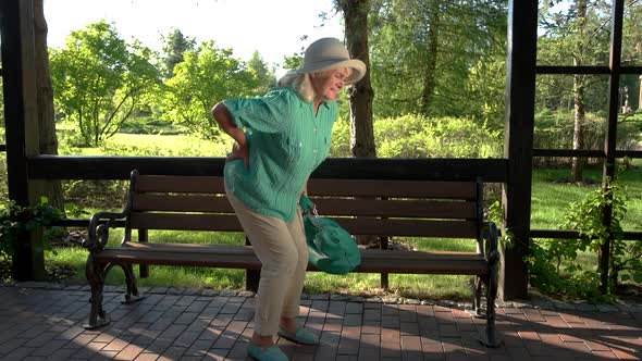 Elderly Woman Has Backache