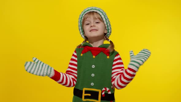 Kid Girl in Christmas Elf Santa Helper Costume Dancing Fooling Around