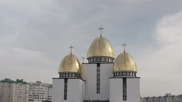 Dome of the Church Aerial View Traditional Old Church in Lviv Ukraine City Cloudy Blue Sky