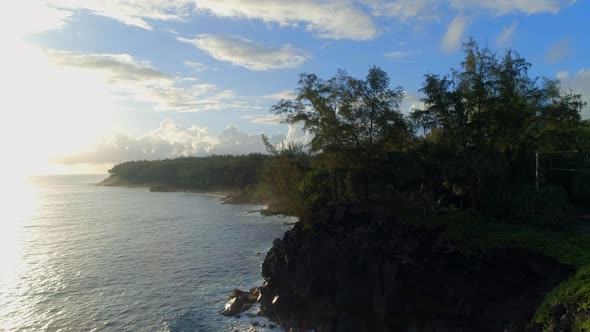 Sunrise Over A Beautiful Coastline with the Sun Rising Over the Sea