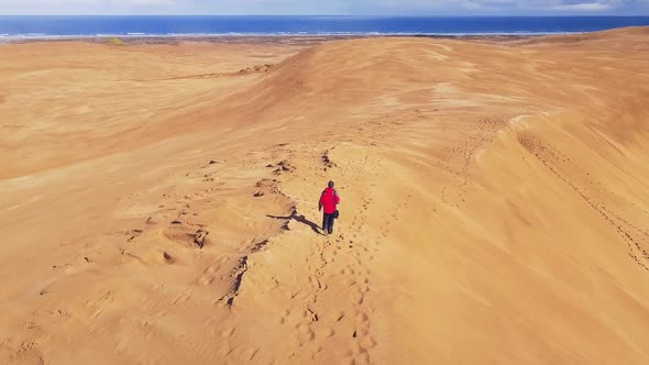 Walking on Giant sand dunes in New Zealand