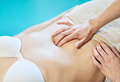 Osteopath performing a pelvic floor recovery massage on a patient - PhotoDune Item for Sale