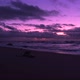 Empty beach at dusk in winter. Slow tilt up from sand to vivid purple gradient sky - VideoHive Item for Sale