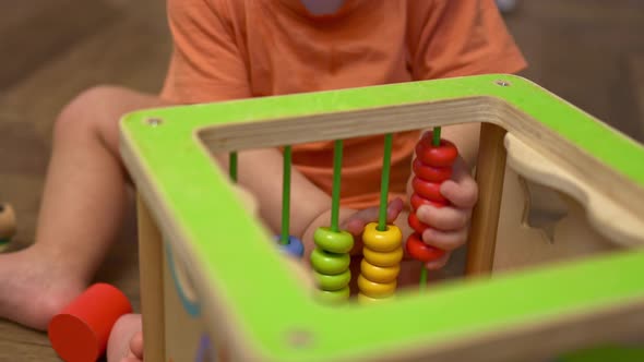 Tiny Baby Kid Toddler Hands Playing Colorful Wooden Abacus Toy