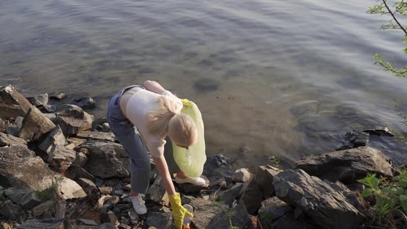 Teamwork Cleaning Plastic on the Beach