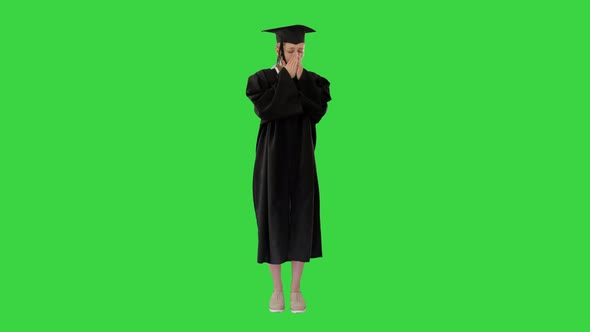 Blonde Graduate Student Standing and Coughing on a Green Screen, Chroma Key.