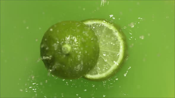 Lime Falling on Juice and Divided in Half