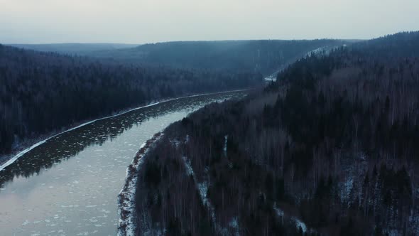Aerial View of the Cold River Rocks and Forest in Early Winter