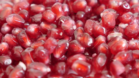 Shallow DOF  of Lythraceae family juicy pomegranate 4K 3840X2160 UHD tilting video -Pile of healthy 