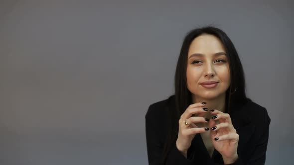 Brunette woman looking at camera