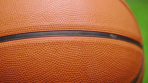 Basketball Ball Close Up on Dark Black Background