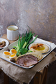 Breakfast with backed meat, hummus and green vegetables, copy space - PhotoDune Item for Sale
