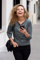 happy woman walking in city with cellphone - PhotoDune Item for Sale