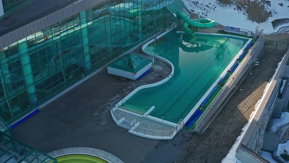 Empty Swimming Pool At Aqua Park Zakopane At Wintertime In Zakopane, Poland.- aerial