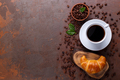 Cup of black coffee and croissant - PhotoDune Item for Sale