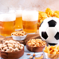 Beer in glasses and snack on wooden table with football ball, football game night food - PhotoDune Item for Sale