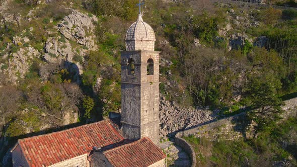 Aerial Shot of the Christian Church on a Way to the Top of the Mountain Where St