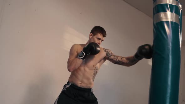 Strong Caucasian Man Boxing Using Punch Sake