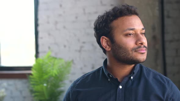 Headshot of Handsome Indian Man Indoor