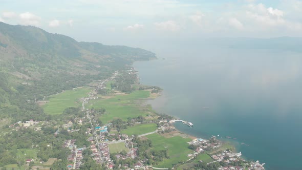 Aerial: lake Toba and Samosir Island from above Sumatra Indonesia. Huge volcanic