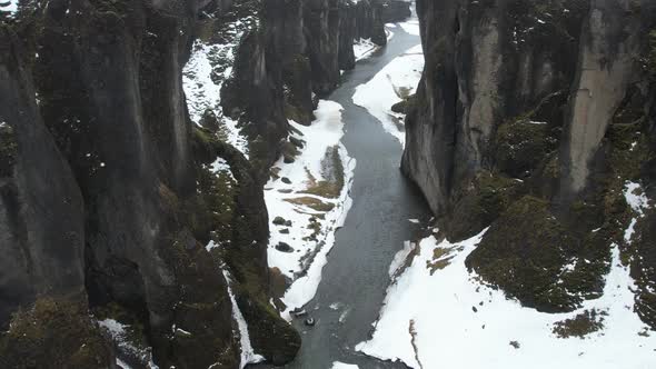 Aerial view of Fjardarargljufur canyon with river in wintertime, Iceland.