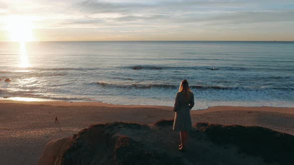 Woman On A Cliff