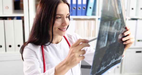 Female Doctor Therapist Examines Xray Slow Motion  Movie