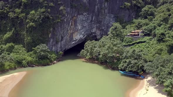 Entrance To Cave Neat Temple on River Bank Bird Eye View