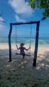 Anse Source d'Argent La Digue Seychelles Young Asian Woman on a Tropical Beach During a Luxury