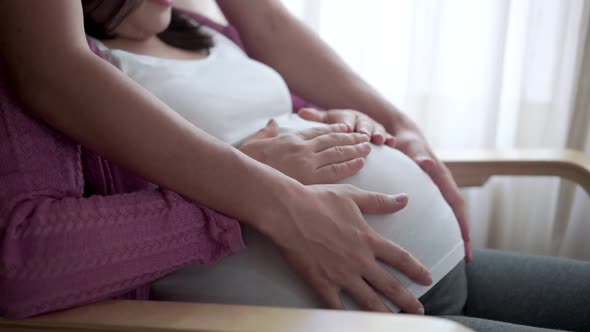 Pregnant Couple Feels Love and Relax at Home