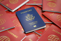 Passport of USA on the pile of passports of other countries. Immigration concept. - PhotoDune Item for Sale