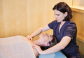 Physiotherapist performing a shoulder massage on a mature woman - PhotoDune Item for Sale