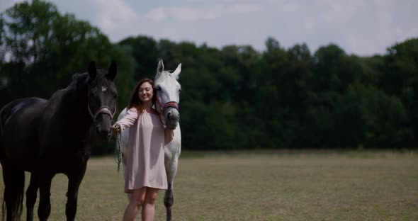 Woman Riding Horse on Farm. Recreation - Woman Walking with Horse