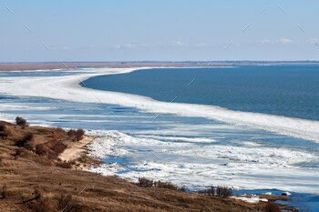 sonally nature landscape of coming spring. Russian Azov sea in Rostov on Don region, beautiful seaside weather changing