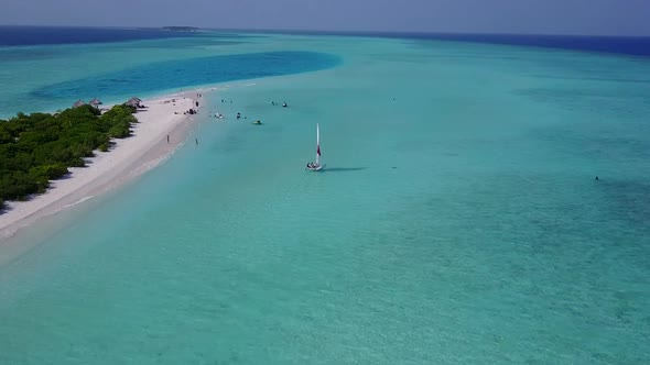 Aerial tourism of marine tourist beach by lagoon and sand background