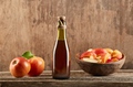 Apple vinegar with apple fruit on old wooden background. Fermented product - PhotoDune Item for Sale