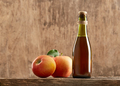 Apple vinegar cider with apple fruit on old wooden background. - PhotoDune Item for Sale