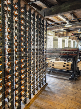 al, Cheshire, in northwest England. It is one of the best preserved textile factories of the Industrial Revolution. Quarry Bank Mill was established by Samuel Greg and dates from 1784.