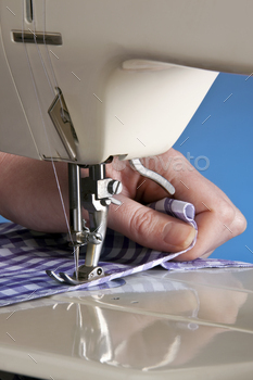 and materials together with thread. Sewing machines were invented during the first Industrial Revolution to decrease the amount of manual sewing work performed in clothing companies.