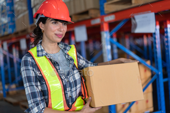 form carrying box in the warehouse distribution. business logistic career, shipping and delivery.