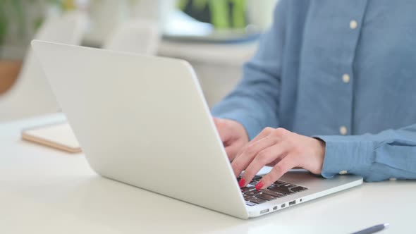 Close up Shot of Woman Typing on Laptop