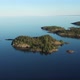 Aerial view on the lake and Islands with rocky coastline and forest in Karelia - VideoHive Item for Sale