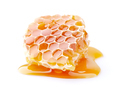 Honeycomb with honey drop on white background - PhotoDune Item for Sale