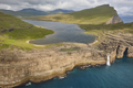Faroe islands dramatic coastline in Vagar. Leitisvatn lake - PhotoDune Item for Sale