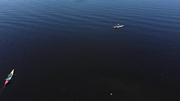 Aerial View From a Drone of a Person Who is Kayaking