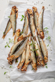 Fresh smoked sprats as appetizer by the sea. - PhotoDune Item for Sale