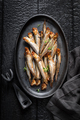 Healthy smoked sprats as appetizer by the sea. - PhotoDune Item for Sale