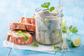 Tasty and healthy marinated herring in jar with oil. - PhotoDune Item for Sale
