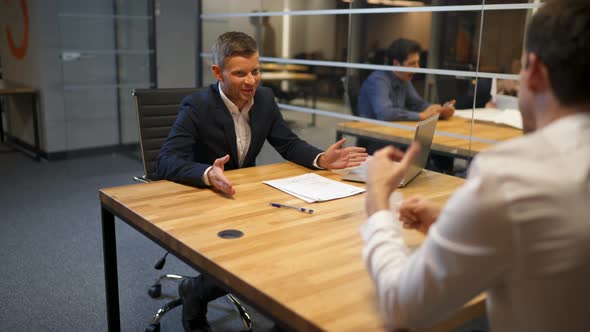 The Man and Woman Speaks with Lawyer in Bank Boardroom