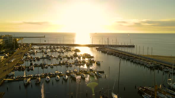 Marina Gdynia With Sailboats And Yachts Floating At The Serene Waters Of Baltic Sea During A Golden